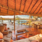 Wooden deck and swimming pool beside the lagoon at Lagoon Camp.