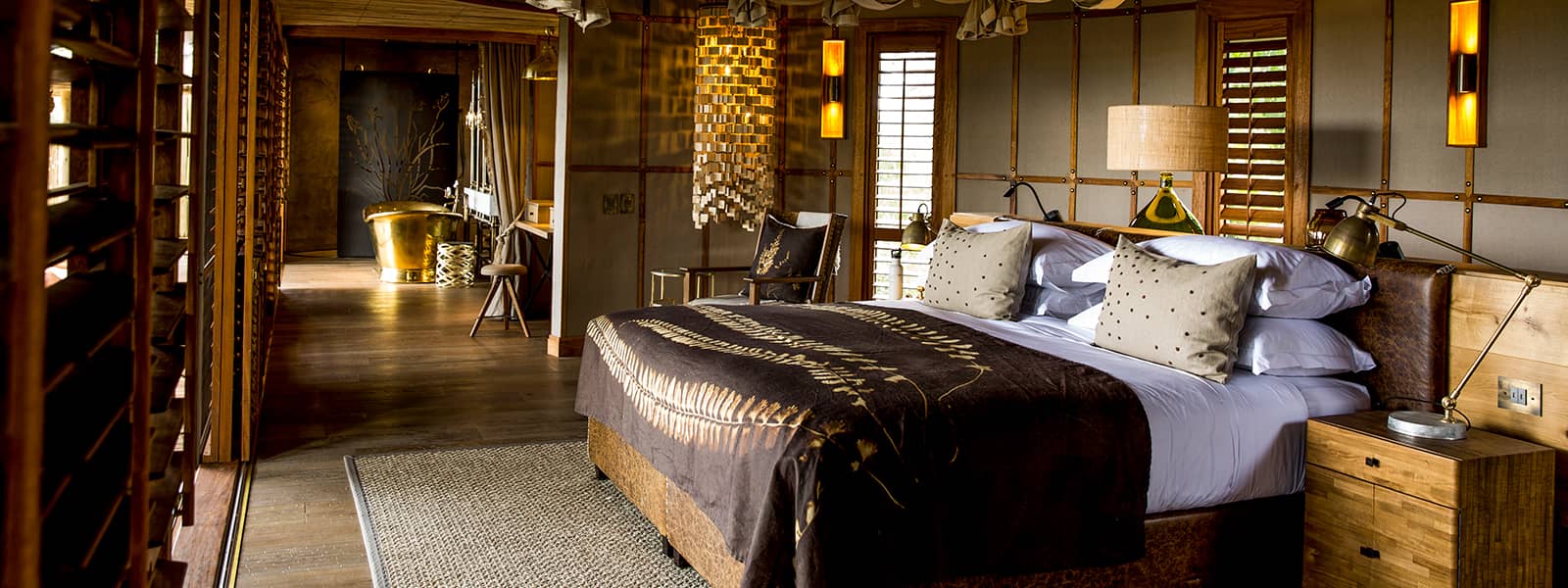 Guest room peek view at Little Mombo camp