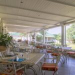 Early morning breakfast served outdoors on the terrace at Batonka Guest Lodge