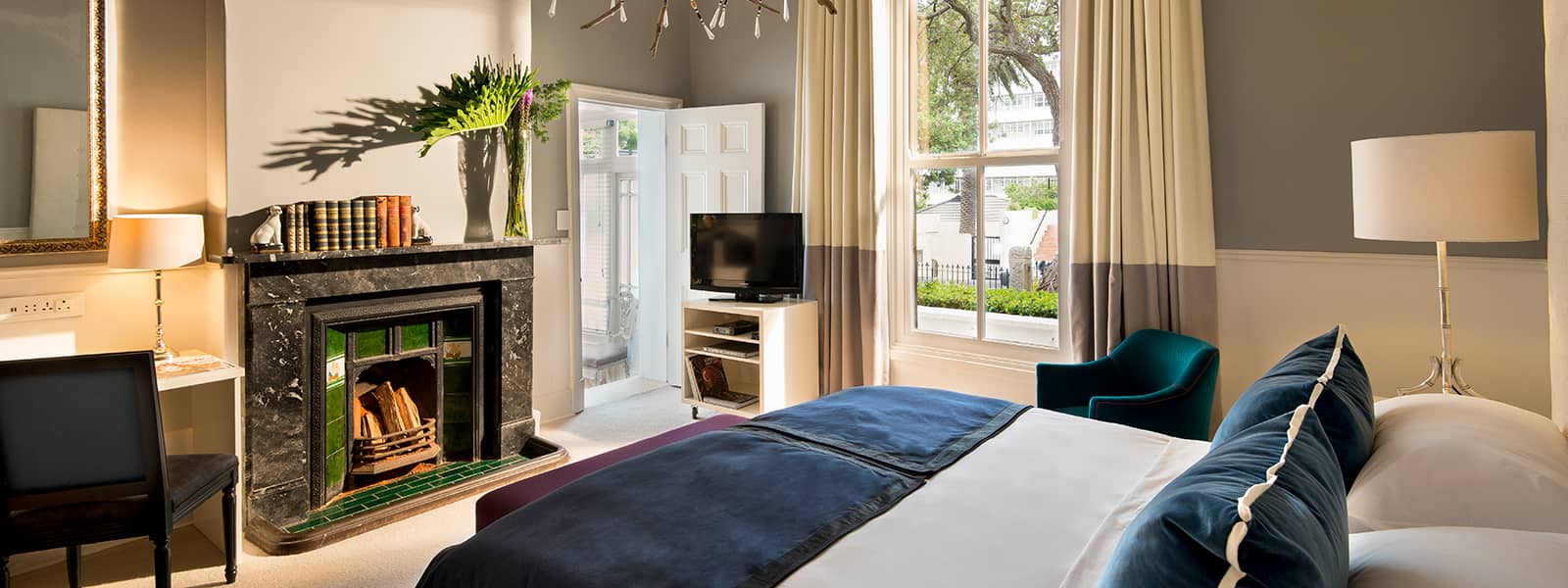 Cape Cadogan classic room with fireplace