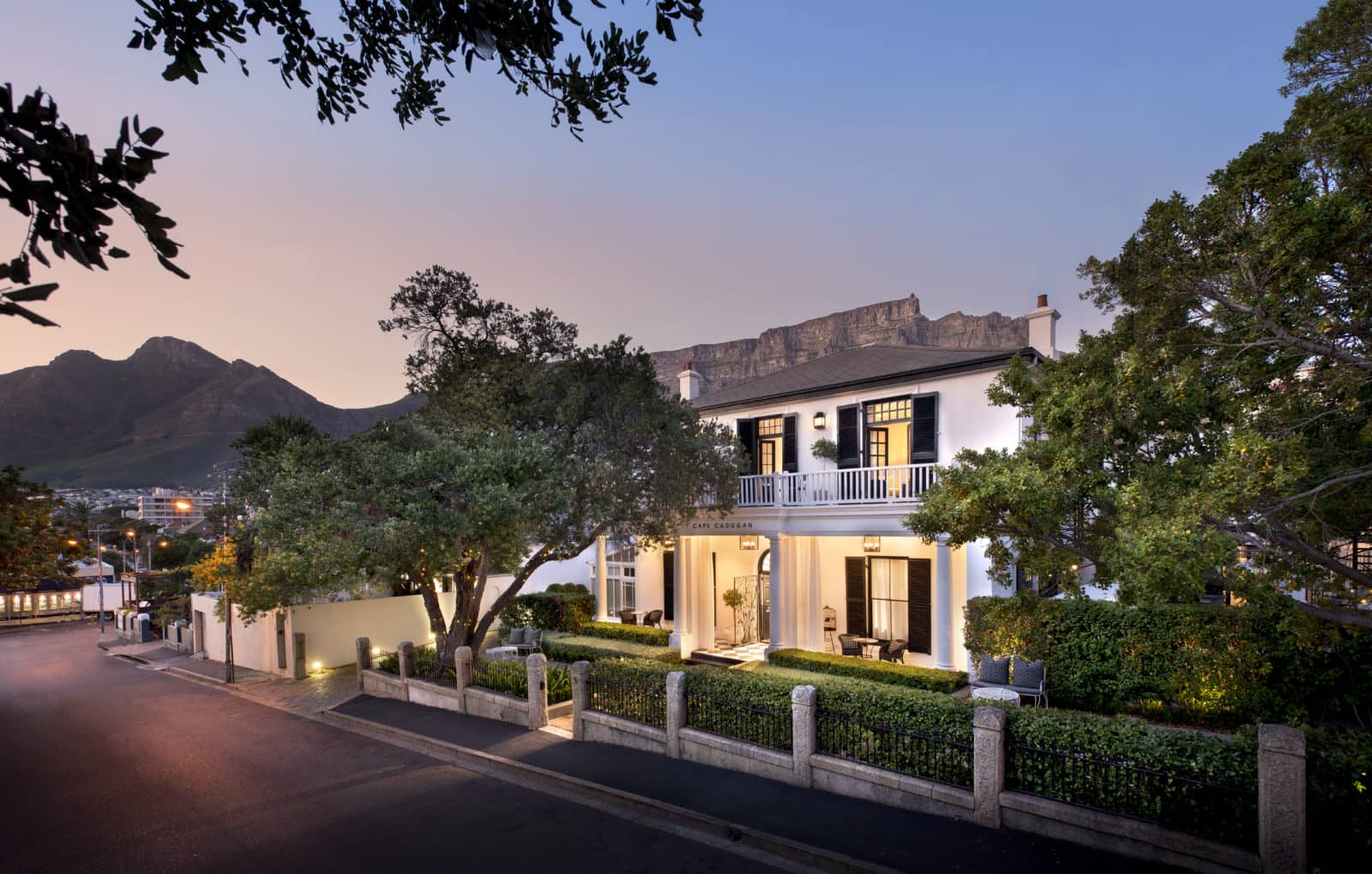 Exterior of elegant Cape Cadogan with Table Mountain backdrop