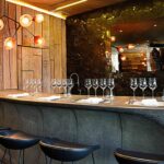 Wine tasting in the Ellerman House cellar is a signature experience