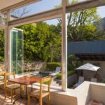 Four Rosmead garden through glass view