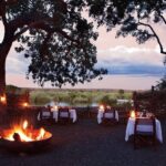 Matetsi guests enjoy a traditional Boma dinner with panoramic views