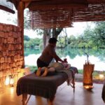 Guest indulging in a luxury bush massage at Matetsi River Lodge