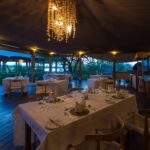 The dining area on the deck at Toka Leya