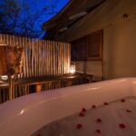 Soak in romantic star bath tubs at Toka Leya