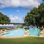 The refreshing swimming pool set in magnificent gardens at The Royal Livingstone
