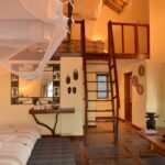 Sunset through the family roomwindow at Muchenje Safari Lodge