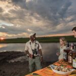 Sundowners are enjoyed at scenic spots during afternoon drives courtesy of Muchenje