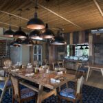 The stylish indoor dining area at Thorntree River Lodge