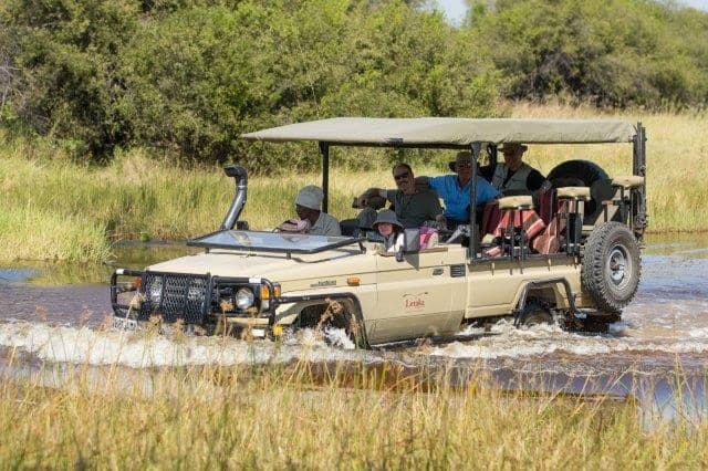 Birding safari guests brave the delta waters by safari vehicle courtesy of Letaka Safaris