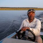 Zambezi Queen's fishing guides assist guests with catch and release tiger fishing