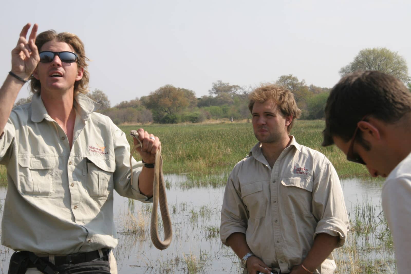 Guides participate in a snake course offered by African Guide Academy