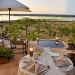 Ngoma Safari Lodge private room dinner set up with plunge pool view