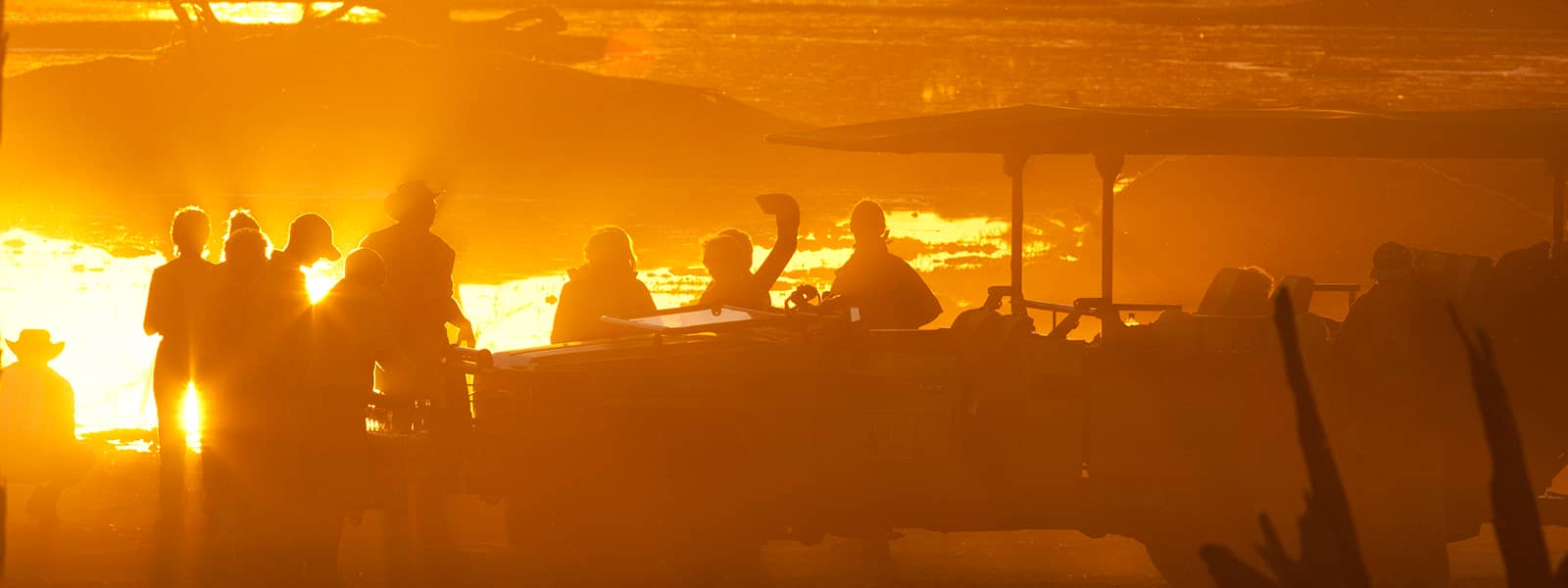 Sundowners at Kwapa camp as the sun sets