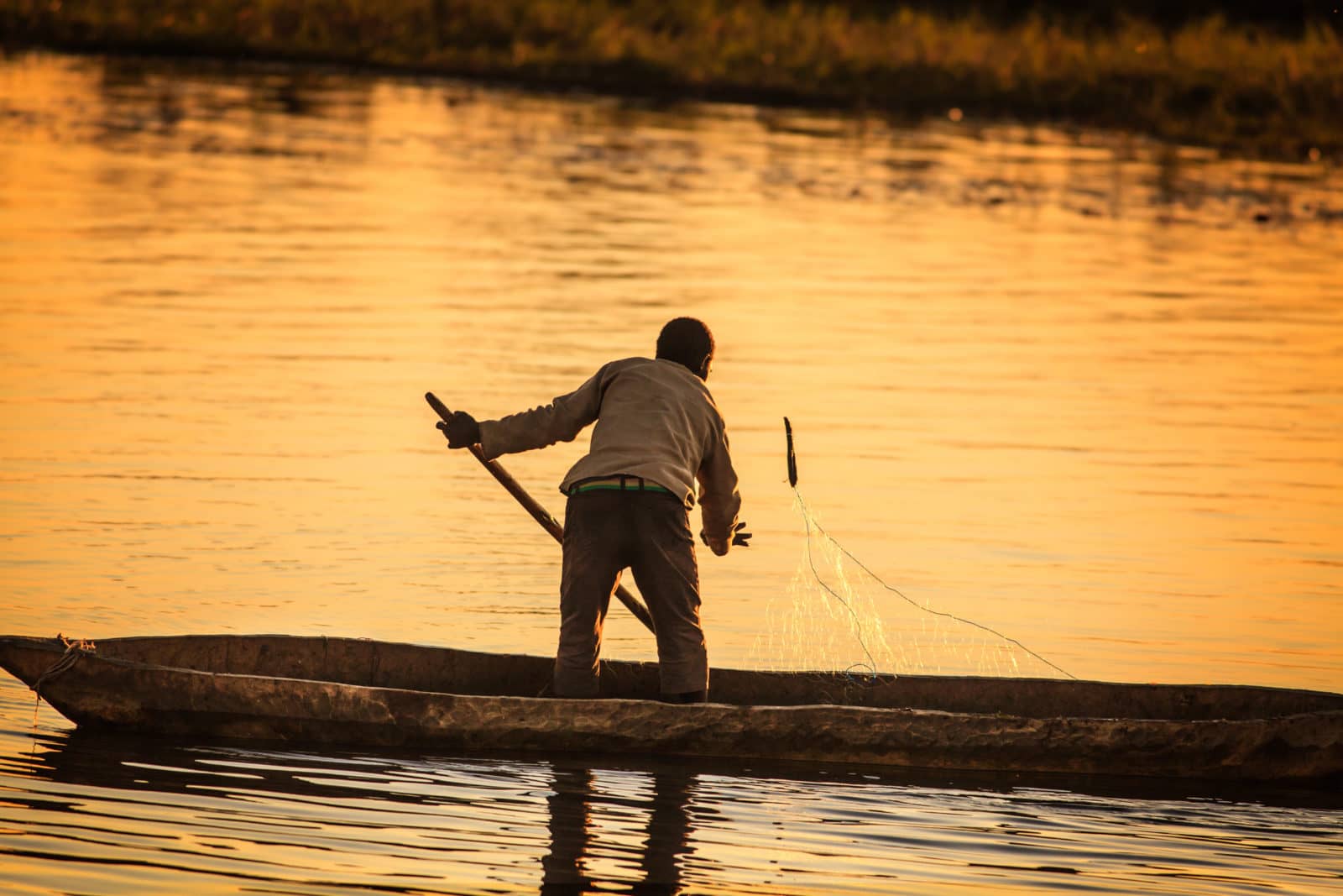 The people of the Okavango Delta fish on a mokoro