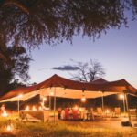 The mess tent lit at night