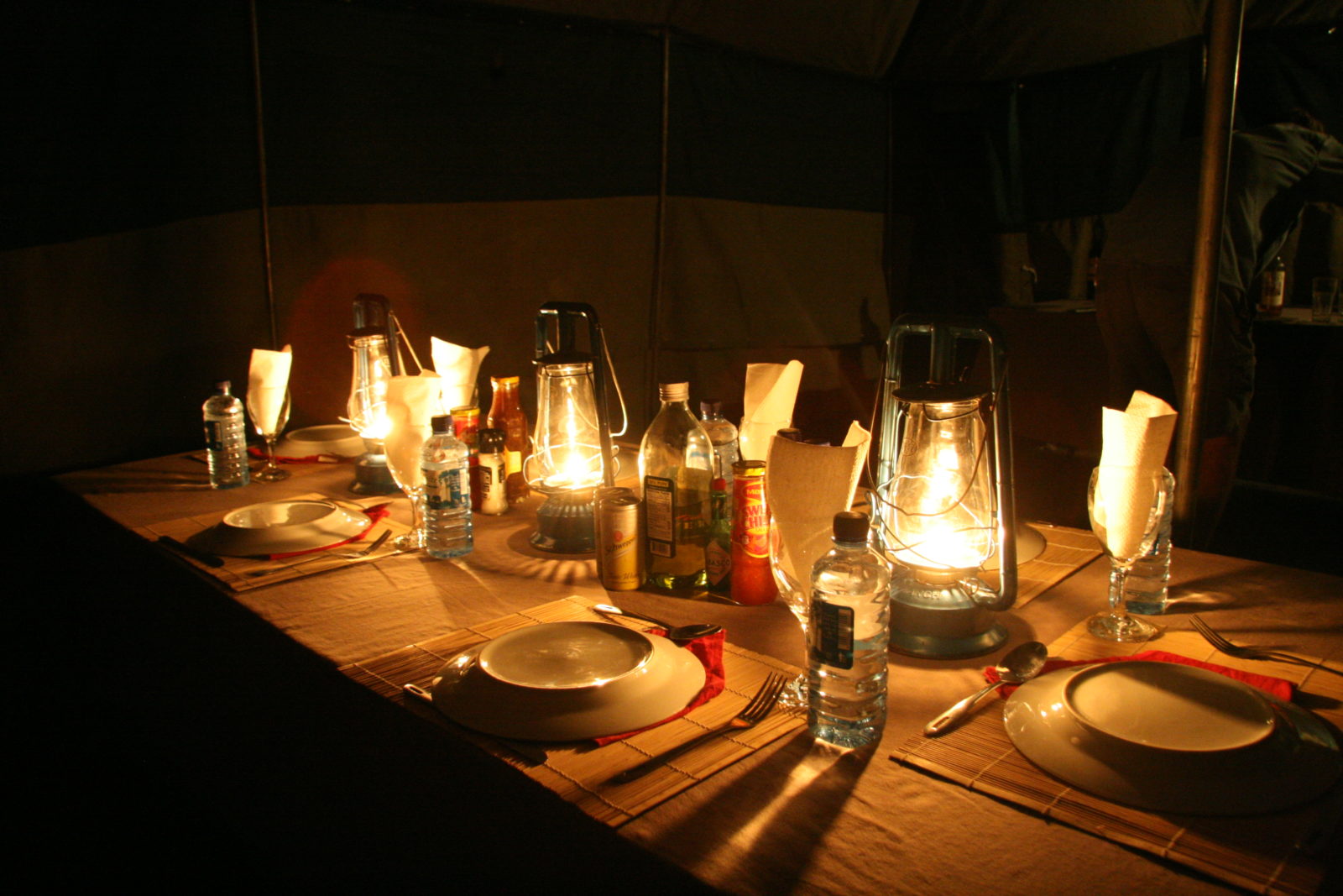 Dinner served and enjoyed by lamplight in the Okavango Delta