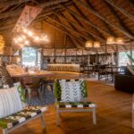 The main area under a large thatch roof at Mogotlho Safari Lodge