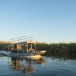 The best way to explore the water ways of the Okavango Delta by boating at Kala Camp.