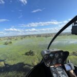 Arrive in style to Kala Camp by helicopter over the Okavango Delta.