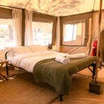 The guest tents at Peake safaris, with curtain for privacy while staying light and breezy