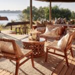 Guest room decks at Victoria Falls River Lodge.