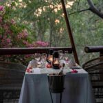 Tuli Safari Lodge Mashatu offers open are dining under the cooling giant fever berry trees.