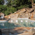 Large pool set around boulders at Tuli Safari Lodge