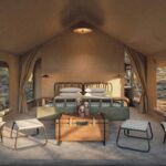 Interior of ensuite tent with double bed gives a fresh safari feel at Sandibe Under Canvas.